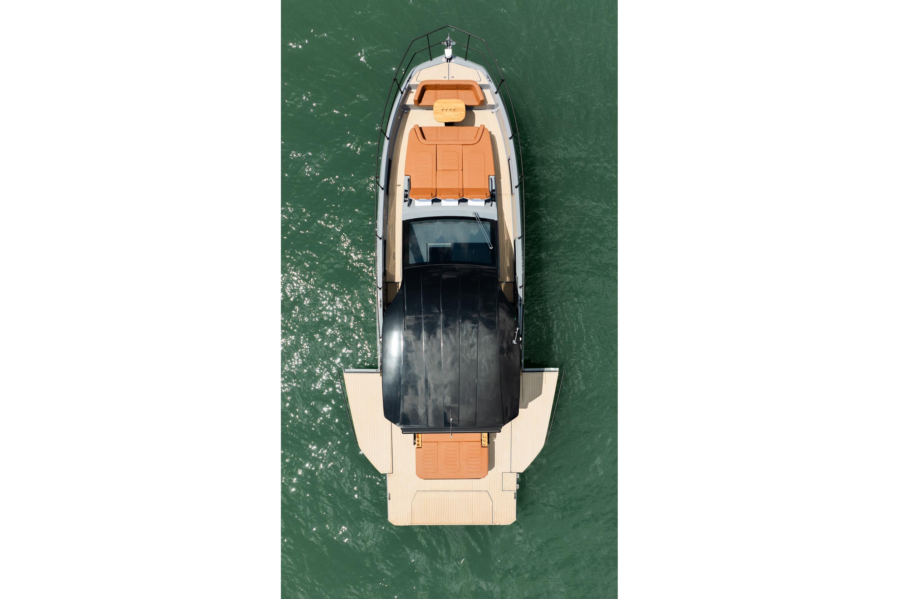 Top view of 2026 Hanover 447 yacht on green water.