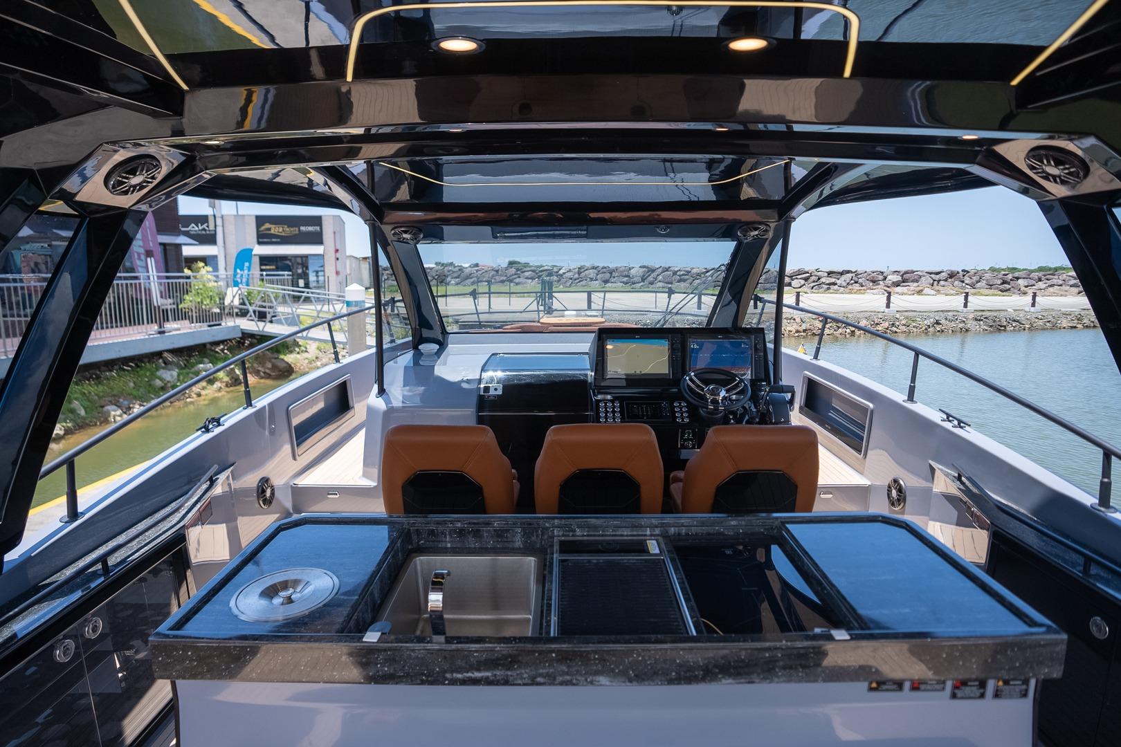 Luxurious 2026 Hanover 447 yacht interior with modern helm and sleek design.