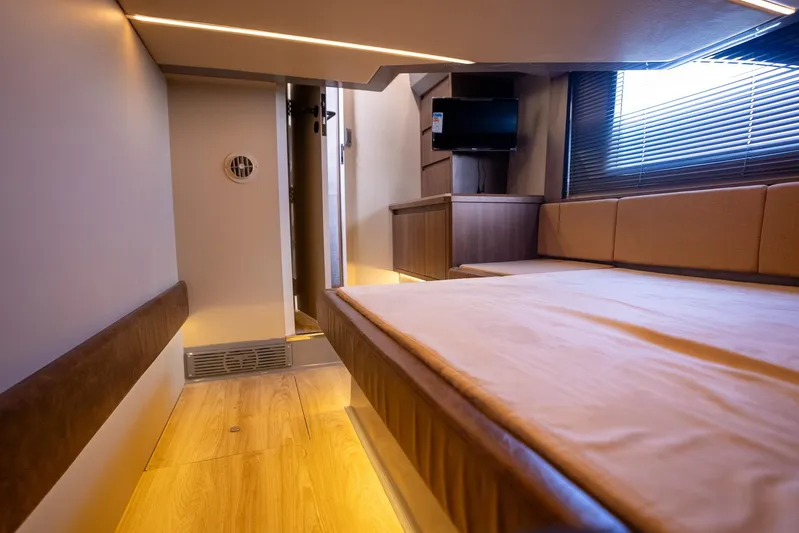  Yacht Photos Pics Luxurious interior of 2026 Hanover 447 yacht with modern furnishings and ambient lighting.