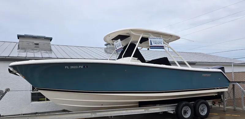  Yacht Photos Pics 2015 Pursuit S280 boat on trailer, blue hull, available for sale.