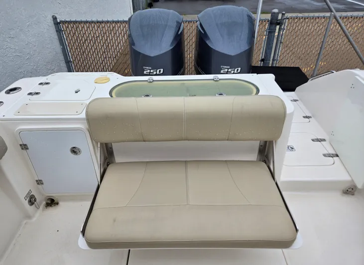  Yacht Photos Pics 2015 Pursuit S280 boat interior with Yamaha 250 engines and beige seating.