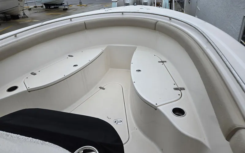  Yacht Photos Pics 2015 Pursuit S280 boat interior with seating and storage compartments.