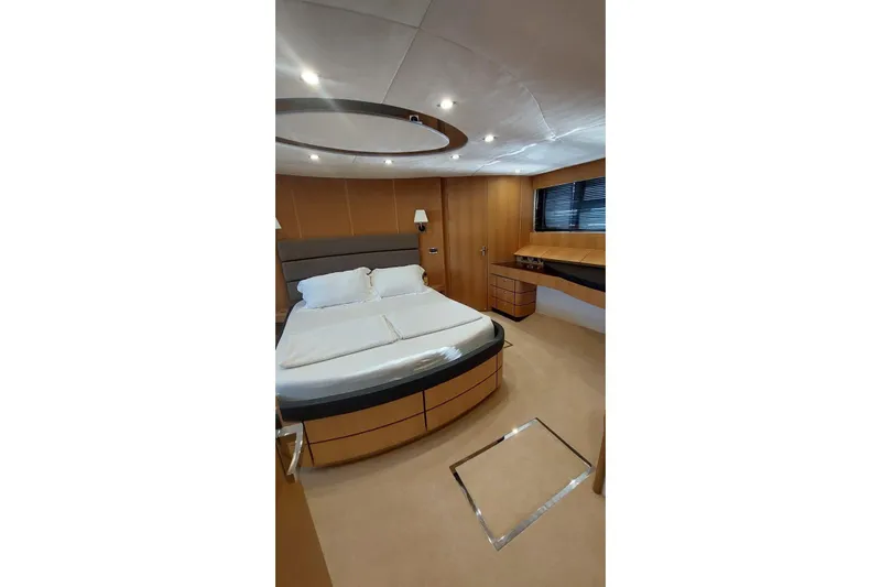  Yacht Photos Pics Luxurious cabin interior of 2010 Fairline Squadron 78 yacht with modern furnishings.