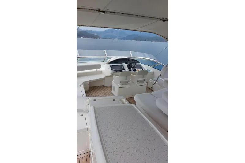  Yacht Photos Pics Luxurious 2010 Fairline Squadron 78 yacht helm with scenic ocean view.