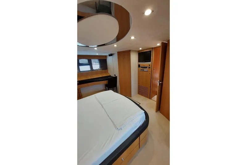 Yacht Photos Pics Luxurious cabin interior of 2010 Fairline Squadron 78 yacht with modern amenities.
