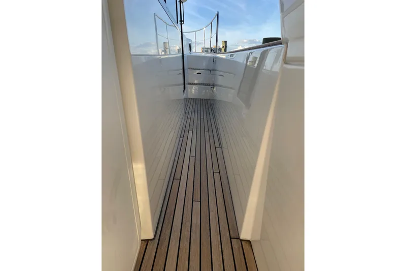 Miss Adventure Yacht Photos Pics 2013 Beneteau Swift Trawler 44 deck with sleek wooden flooring and polished sides.