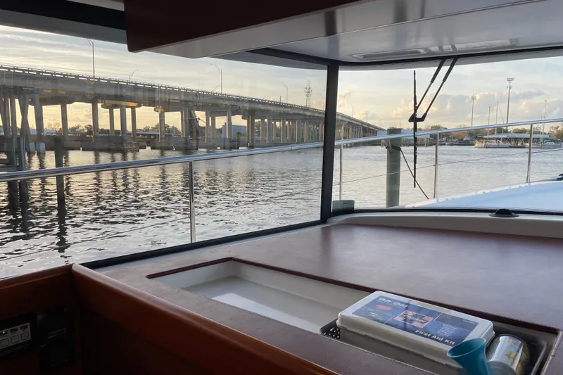 Miss Adventure Yacht Photos Pics 2013 Beneteau Swift Trawler 44 interior view with bridge and waterway in background.