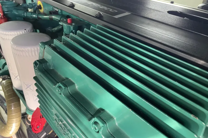 Miss Adventure Yacht Photos Pics Engine compartment of a 2013 Beneteau Swift Trawler 44, showcasing detailed components.