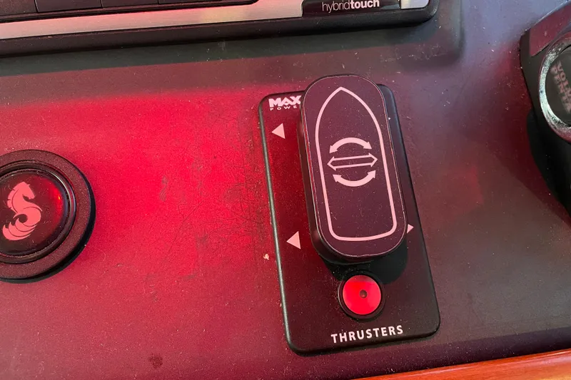 Miss Adventure Yacht Photos Pics Control panel of a 2013 Beneteau Swift Trawler 44, featuring thruster controls.