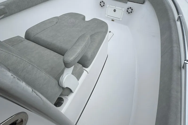  Yacht Photos Pics 2020 Sportsman Open 282TE Center Console boat interior with gray seating and speakers.