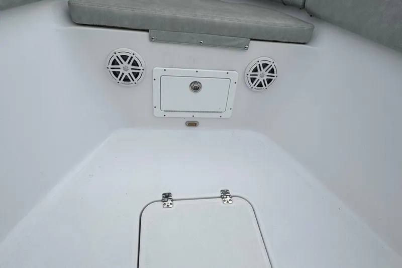  Yacht Photos Pics 2020 Sportsman Open 282TE Center Console interior with speakers and storage hatch.