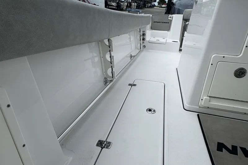  Yacht Photos Pics 2020 Sportsman Open 282TE Center Console boat interior, featuring sleek white deck and seating.