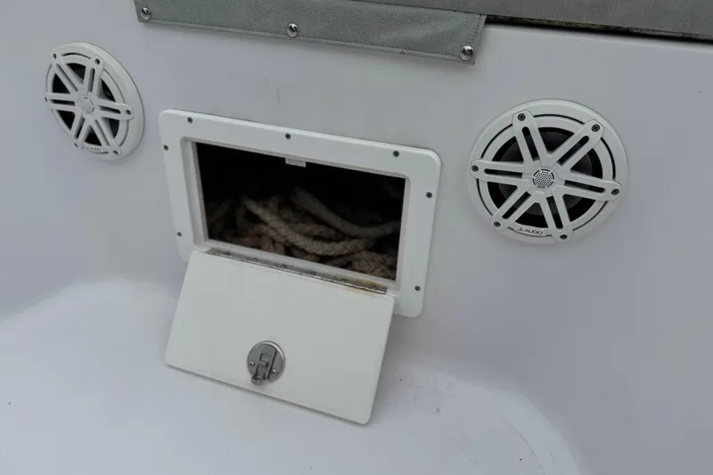  Yacht Photos Pics 2020 Sportsman Open 282TE Center Console with speakers and rope storage compartment.