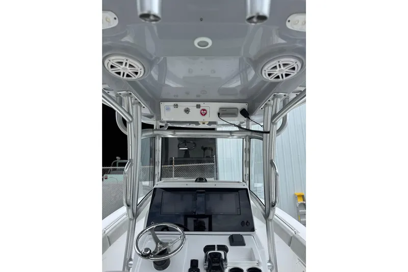  Yacht Photos Pics 2020 Sportsman Open 282TE Center Console boat interior with steering wheel and electronics.