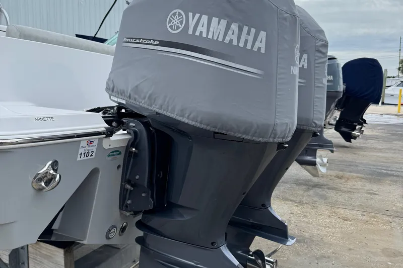  Yacht Photos Pics 2020 Sportsman Open 282TE Center Console with Yamaha outboard motors, docked outdoors.