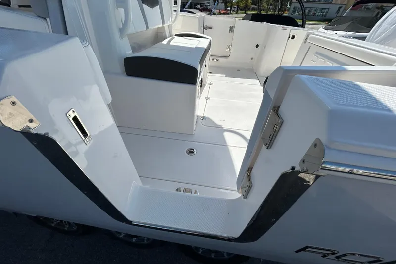  Yacht Photos Pics 2026 Robalo R360 Center Console boat interior with sleek white seating and modern design.