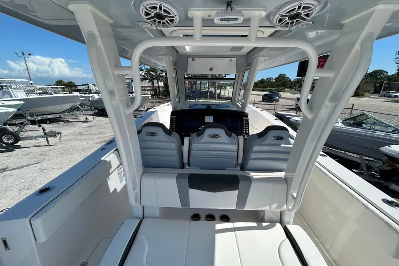  Yacht Photos Pics 2026 Robalo R360 Center Console boat interior with modern seating and control panel.