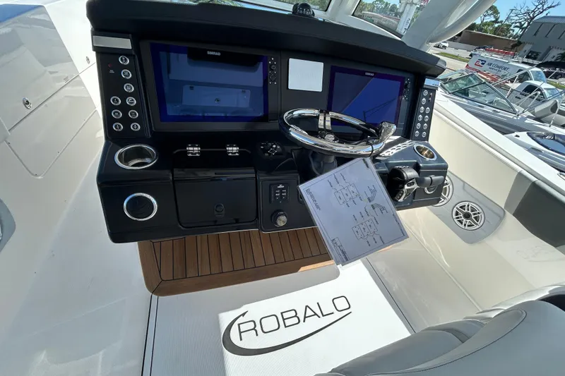  Yacht Photos Pics 2026 Robalo R360 Center Console helm with advanced navigation displays and controls.