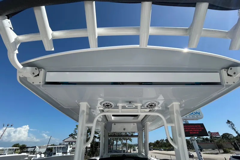  Yacht Photos Pics 2026 Robalo R360 Center Console boat, featuring a sleek overhead view under clear blue skies.