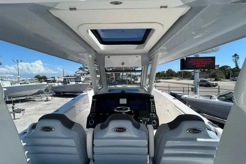  Yacht Photos Pics 2026 Robalo R360 Center Console boat interior with modern dashboard and seating.
