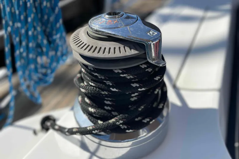 Tiramisu Yacht Photos Pics Winch on 2004 Beneteau Oceanis 473 sailboat with coiled rope.