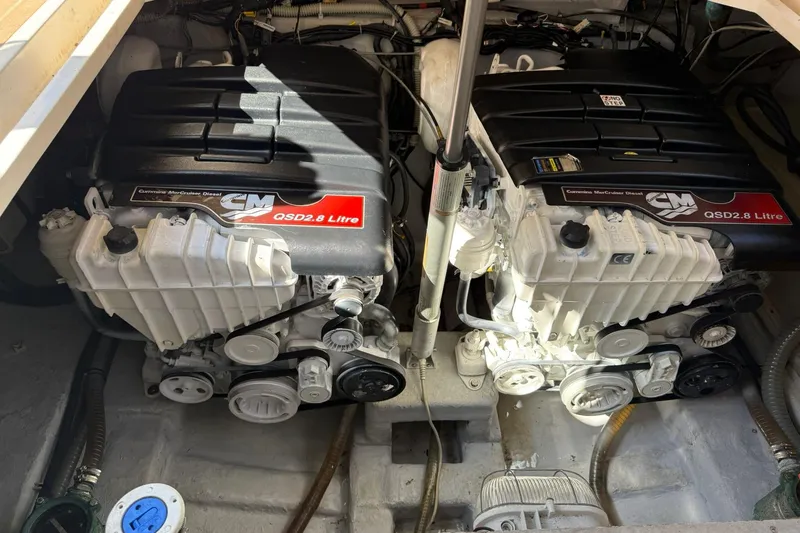 Piccopi Yacht Photos Pics Twin engines in a 2007 Mano Marine 32.50 Sport boat, showcasing QSD 2.8 Litre diesel power.