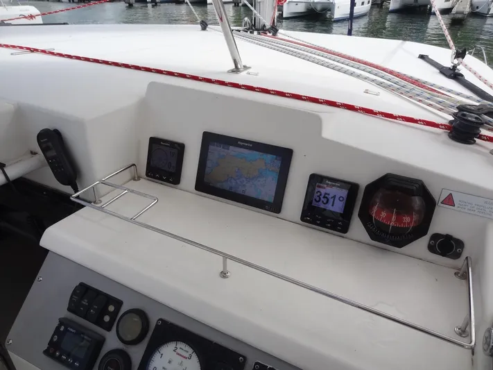 Maupiti Yacht Photos Pics Leopard 40 2019 yacht cockpit with navigation instruments and control panel.