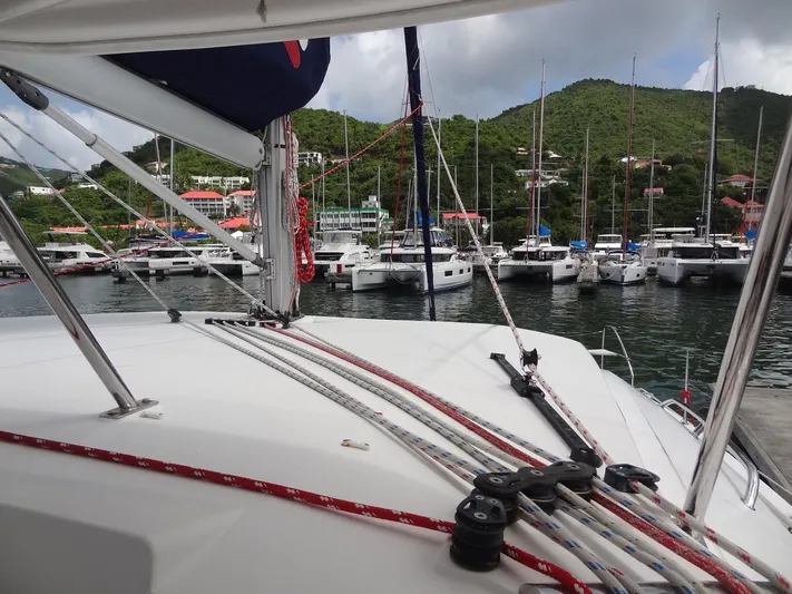 Maupiti Yacht Photos Pics View from a 2019 Leopard 40 catamaran docked at a marina with other boats.