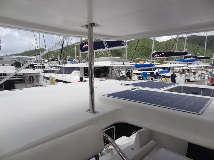 Maupiti Yacht Photos Pics 2019 Leopard 40 catamaran docked at marina with solar panels on deck.