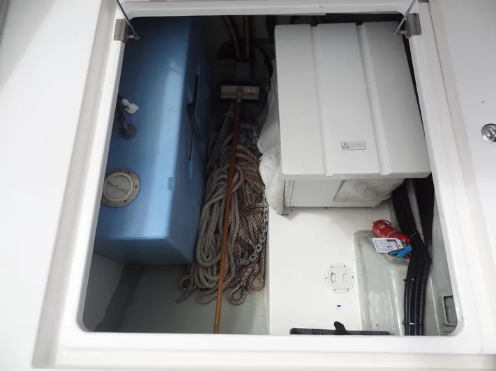 Maupiti Yacht Photos Pics Storage compartment of a 2019 Leopard 40 catamaran with ropes and equipment.