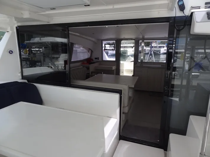 Maupiti Yacht Photos Pics Interior view of 2019 Leopard 40 catamaran with seating and dining area.