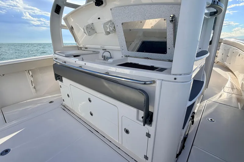Vandy Yacht Photos Pics 2024 Solace 41 CS boat interior with sleek kitchen and ocean view.