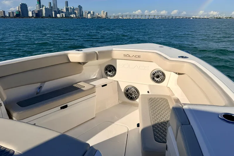 Vandy Yacht Photos Pics 2024 Solace 41 CS boat interior with city skyline and ocean view.