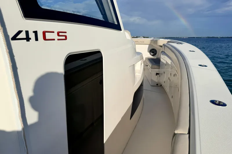 Vandy Yacht Photos Pics 2024 Solace 41 CS boat on water with rainbow in background.