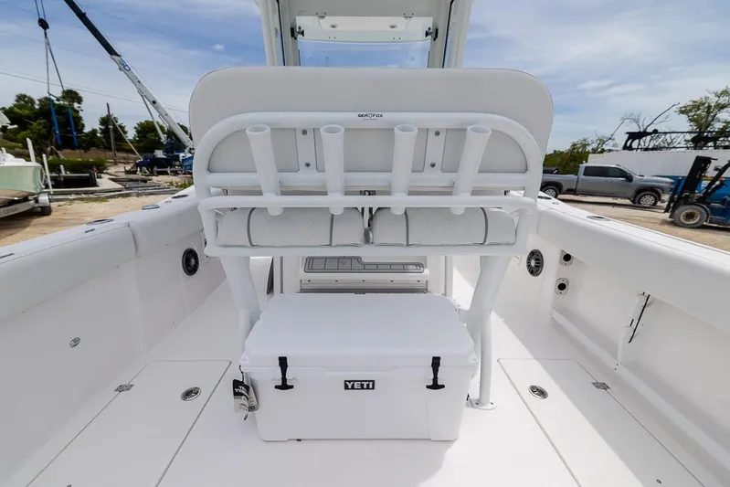  Yacht Photos Pics 2026 Sea Fox 268 Commander boat interior with seating and Yeti cooler.