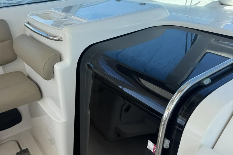  Yacht Photos Pics 2005 Tiara Yachts 3200 Open interior with beige seating and sleek cabin entrance.