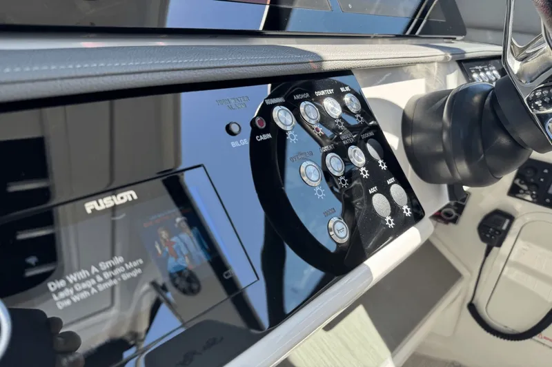  Yacht Photos Pics Control panel of 2023 Sea Ray 320 Sundancer boat with Fusion audio system.