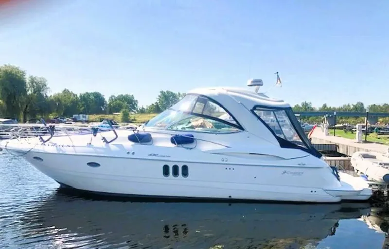  Yacht Photos Pics 2006 Cruisers Yachts 420 Express docked on a sunny day.