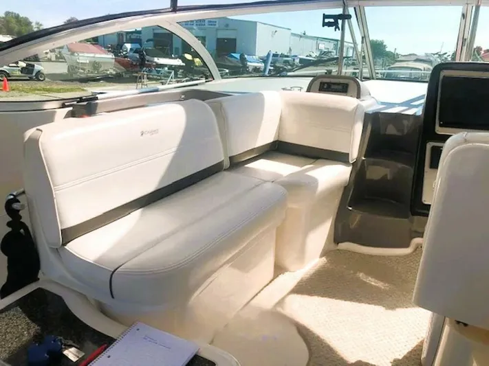  Yacht Photos Pics Interior of 2006 Cruisers Yachts 420 Express with white seating and modern design.