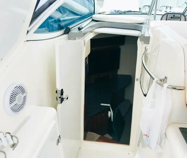  Yacht Photos Pics 2006 Cruisers Yachts 420 Express cabin entrance with open door and interior view.