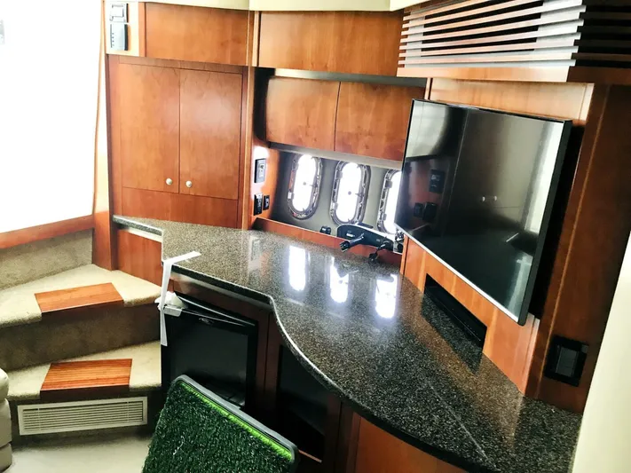  Yacht Photos Pics Interior of 2006 Cruisers Yachts 420 Express with modern wood cabinetry and granite countertop.