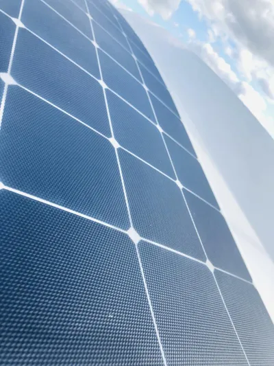  Yacht Photos Pics Solar panel on 2006 Cruisers Yachts 420 Express under a cloudy sky.