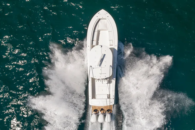 Hi Yacht Photos Pics 2020 Regulator 34 Center Console boat cruising on open water, aerial view.