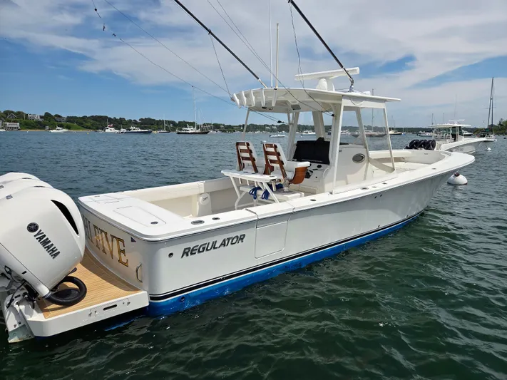 Hi Yacht Photos Pics 2020 Regulator 34 Center Console boat on water with Yamaha engines.