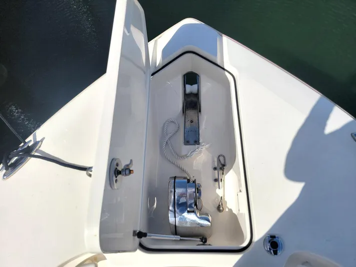  Yacht Photos Pics Anchor compartment of 2018 Scout 275 LXF boat with rope and metal fittings.