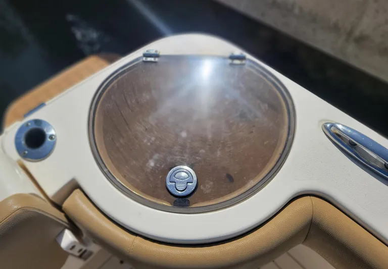  Yacht Photos Pics 2018 Scout 275 LXF boat detail with circular hatch and beige seating.