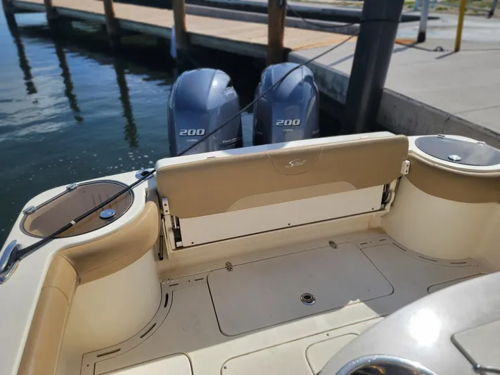  Yacht Photos Pics 2018 Scout 275 LXF boat with twin 200 horsepower engines at dock.