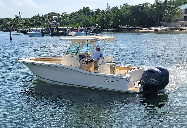  Yacht Photos Pics 2018 Scout 275 LXF boat cruising on a sunny day with Yamaha engines.