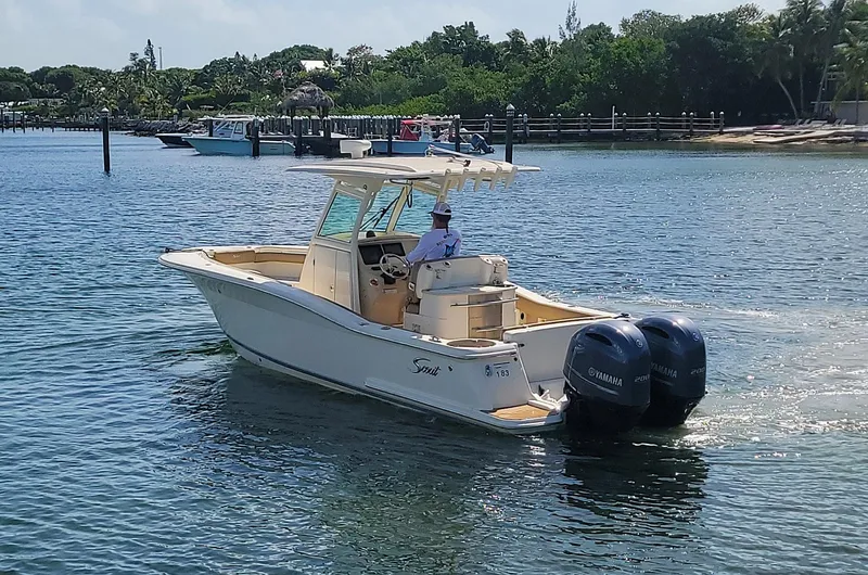  Yacht Photos Pics 2018 Scout 275 LXF boat with dual Yamaha engines on a sunny day.