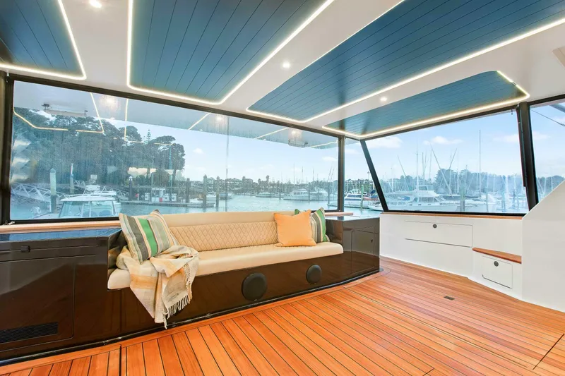 "the Keys" Yacht Photos Pics Luxurious interior of 2021 Valder Yachts Powercat with panoramic marina view.